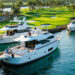 Luxury yacht moored near coastal golf resort