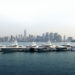 Modern Zhuhai marina with luxury yachts at pontoon