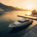 Luxury marina and yachts at sunset in Hong Kong