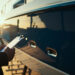 Freshly detailed yacht hull prepared for inspection before sale