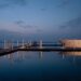 Calm marina berth planning scene at dusk