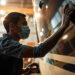 Professional inspection of mirror-grade yacht paint finish