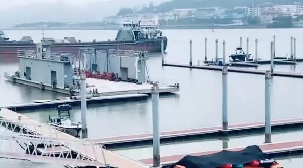 Floating dock, access walkway and berthing facilities at the Macau shipyard
